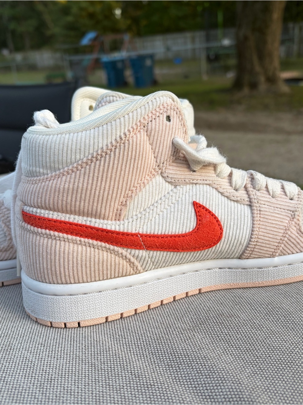 Nike Women’s Mid-Top Corduroy Sneakers in Cream & bright orange. Air Jordans
